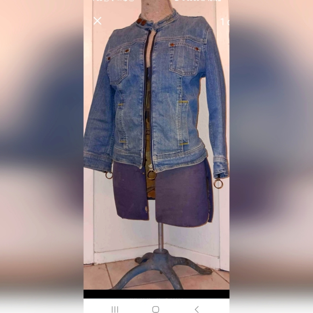 Calvin Klein. Small Womans blue jean jacket. Zipper